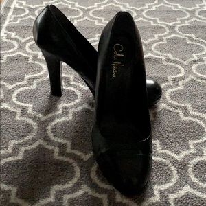 Cap toe high heel pumps